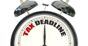 Old Alarm Clock Tax Deadline Text