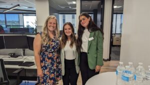 Topel Forman accounting firm’s Denver interns and their coach during summer 2023, pictured together in the office.