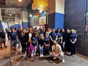 Topel Forman team members gathered outside the historic Billy Goat Tavern in Chicago during a firm social outing.