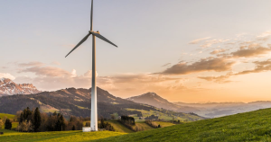 windmill energy efficiency along mountains representing energy tax credits